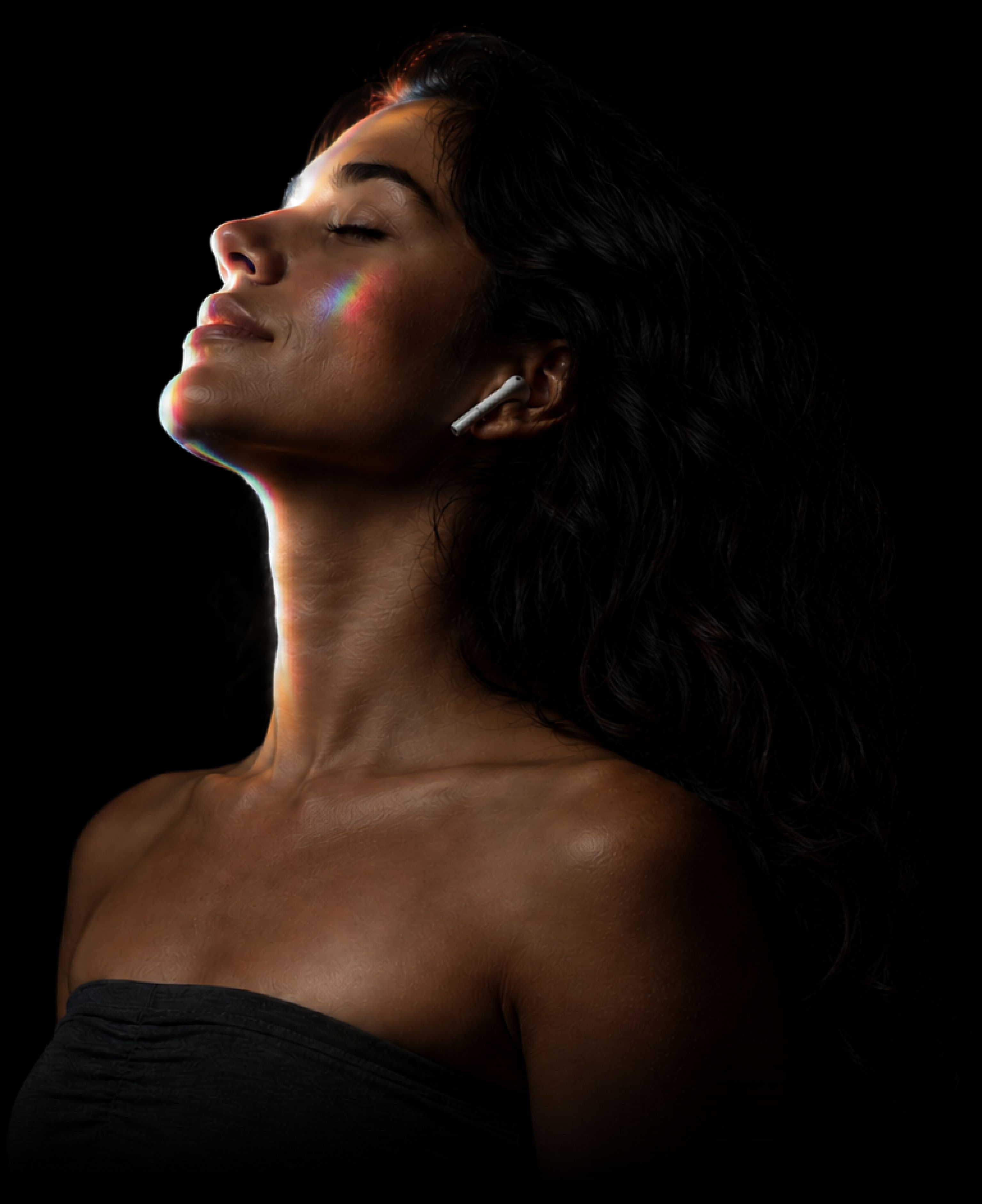 Listening on AirPods, lit by the music